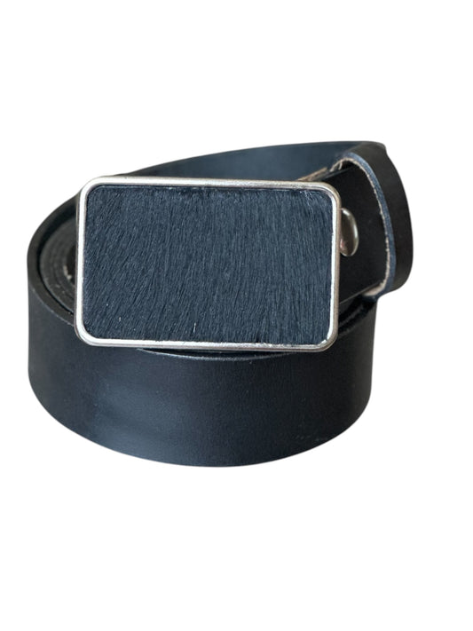 A black hair on leather rectangular belt buckle with either antique brass or antique silver finish, displayed on a white background.