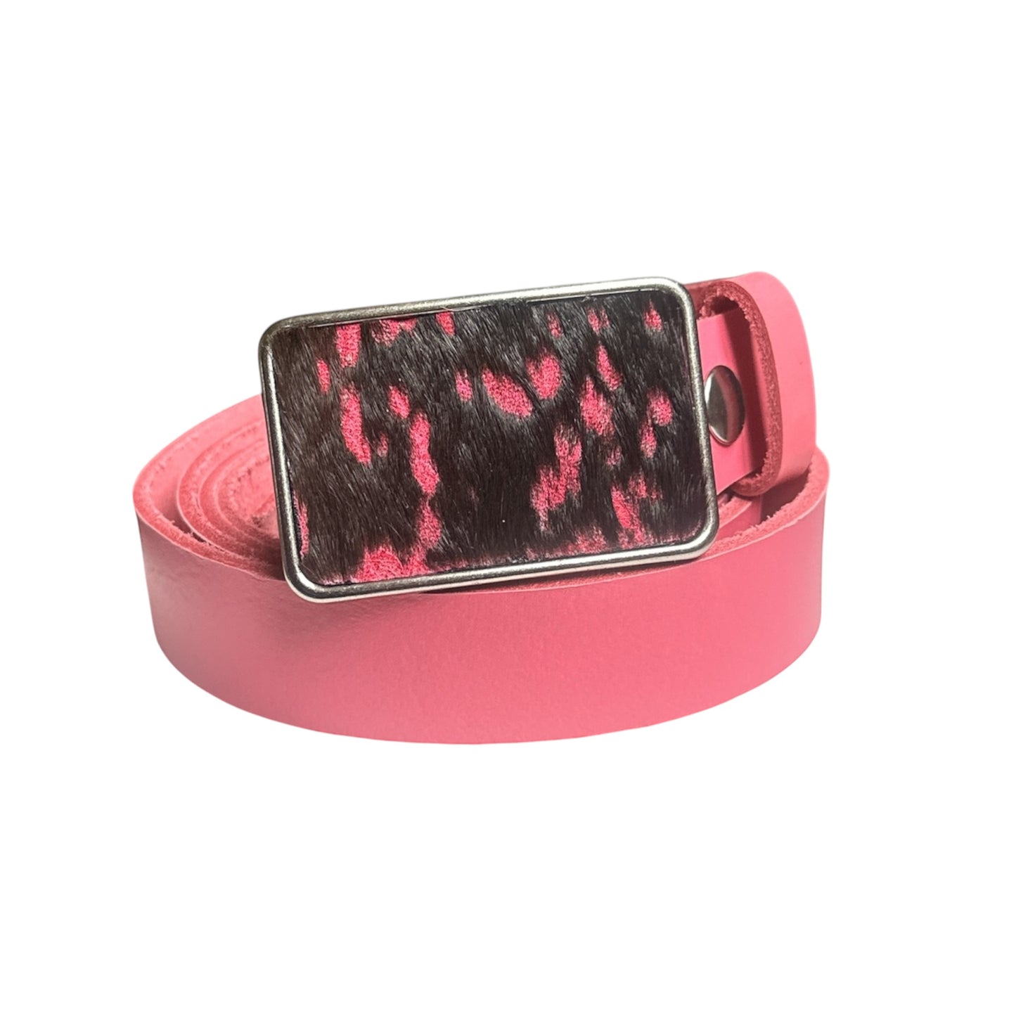 A black and hot pink hair on leather belt buckle mounted on a pink belt, displayed against a white background.