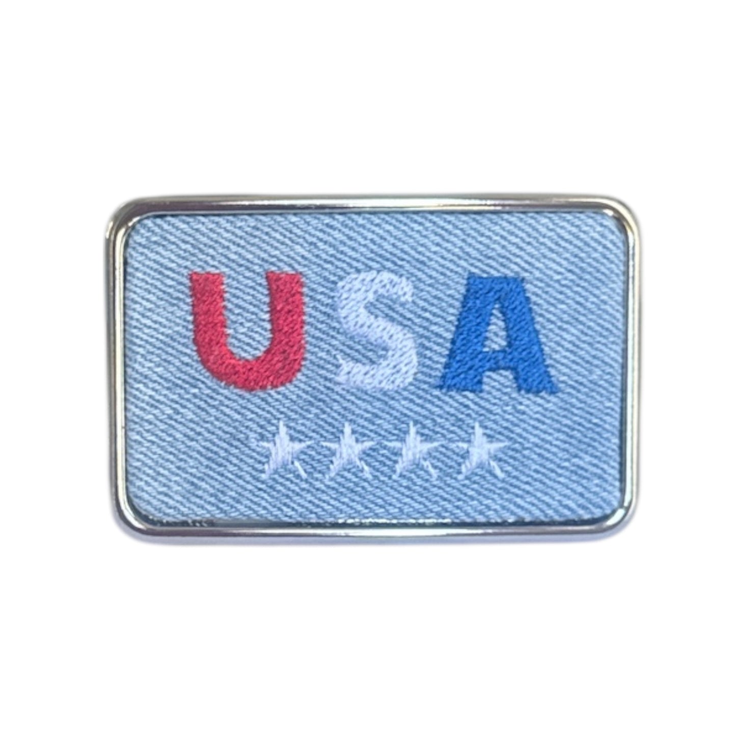 Rectangular belt buckle with 'USA' embroidered in red, white, and blue on a light blue denim on white background.