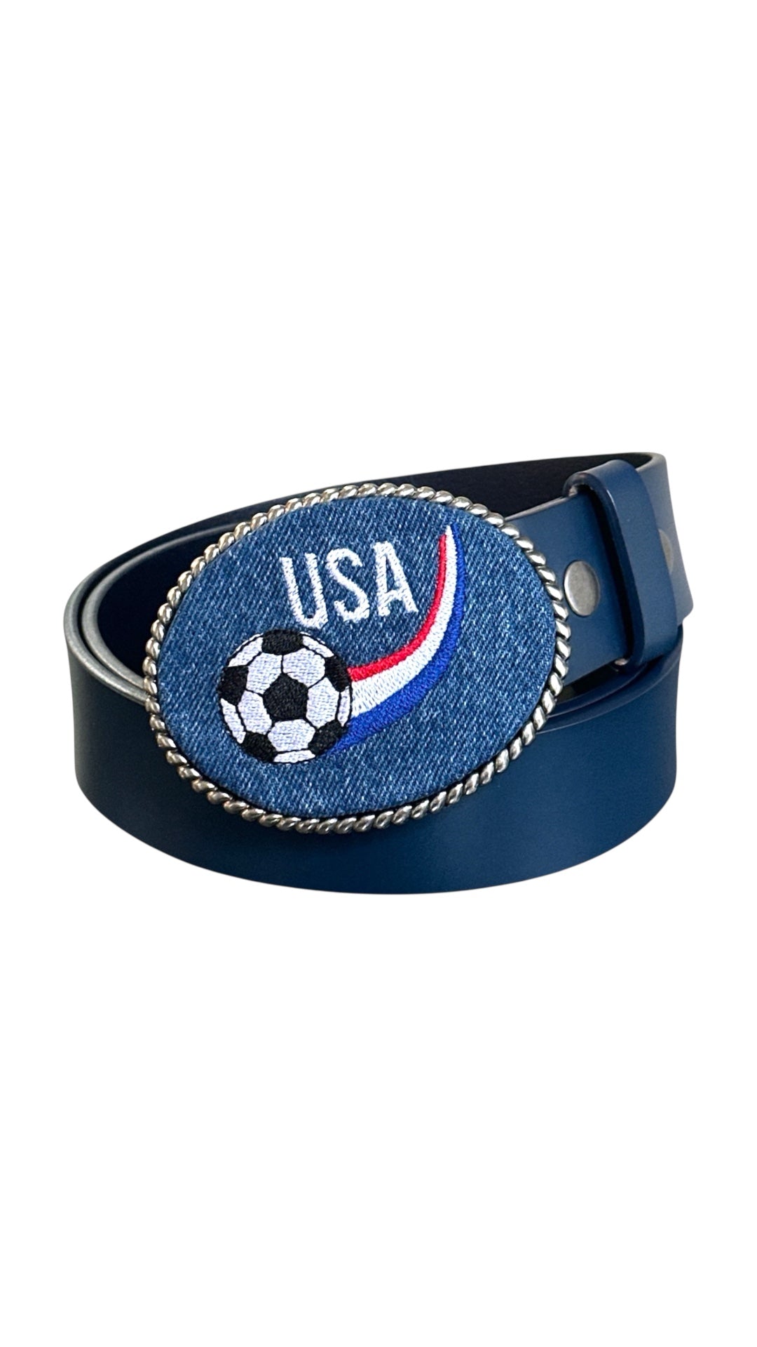 Dark denim Blue belt buckle with USA soccer ball next to a red, white, blue rainbow design on a white background