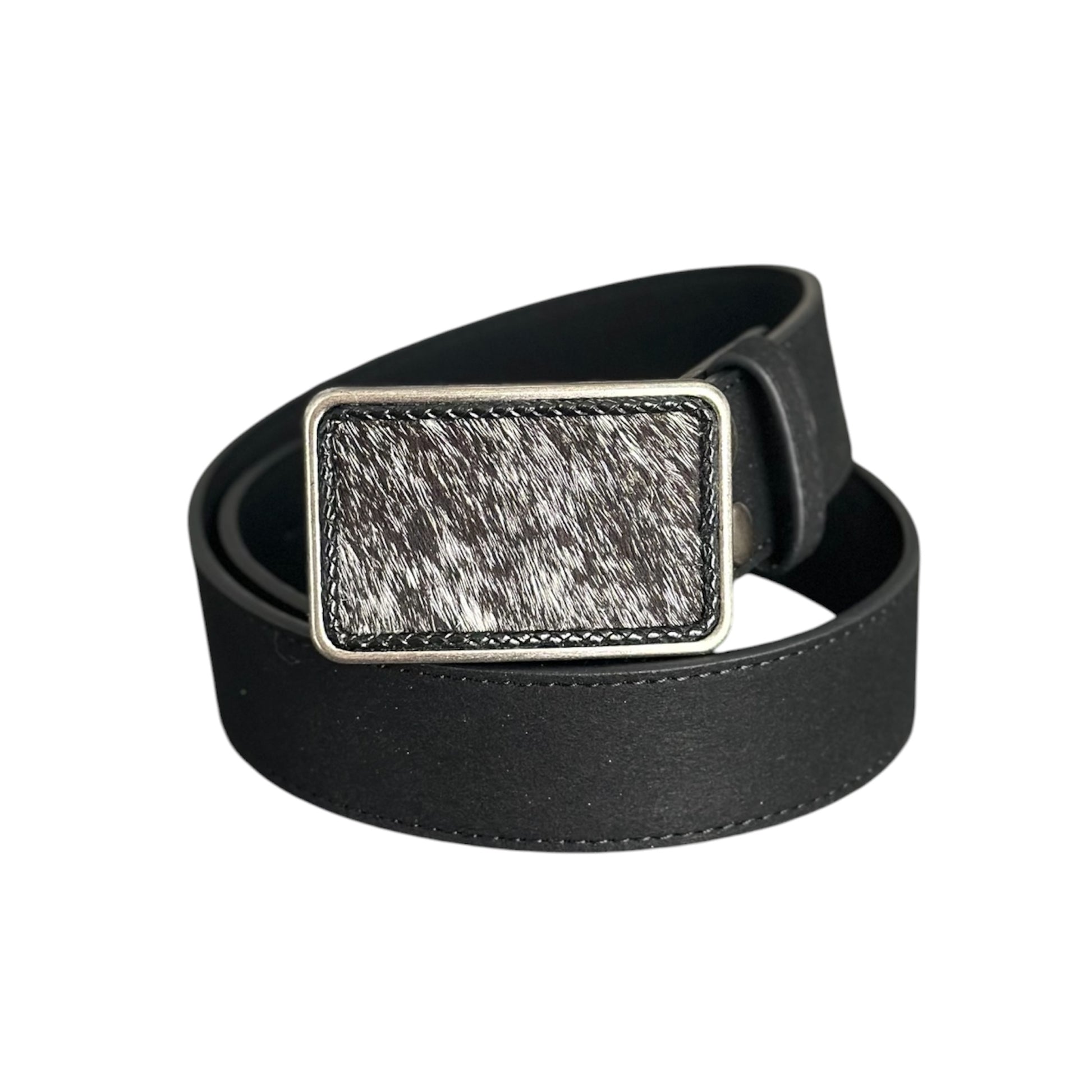 A black suede belt with a rectangular silver-tone metal buckle and a hair on hide black and white cowhide inlay,  on a white background.