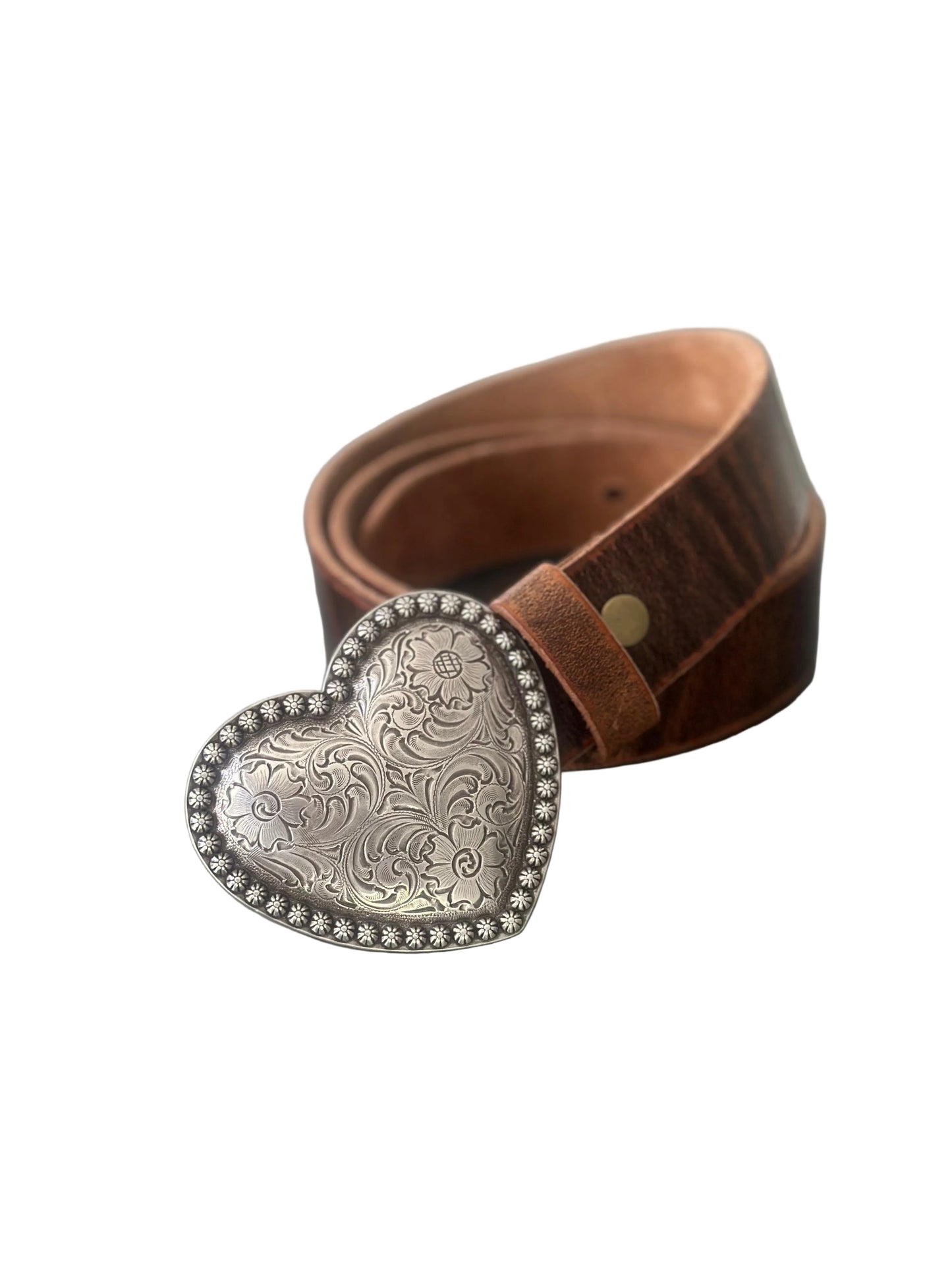 Brown leather belt with a silver heart-shaped buckle on a white background 