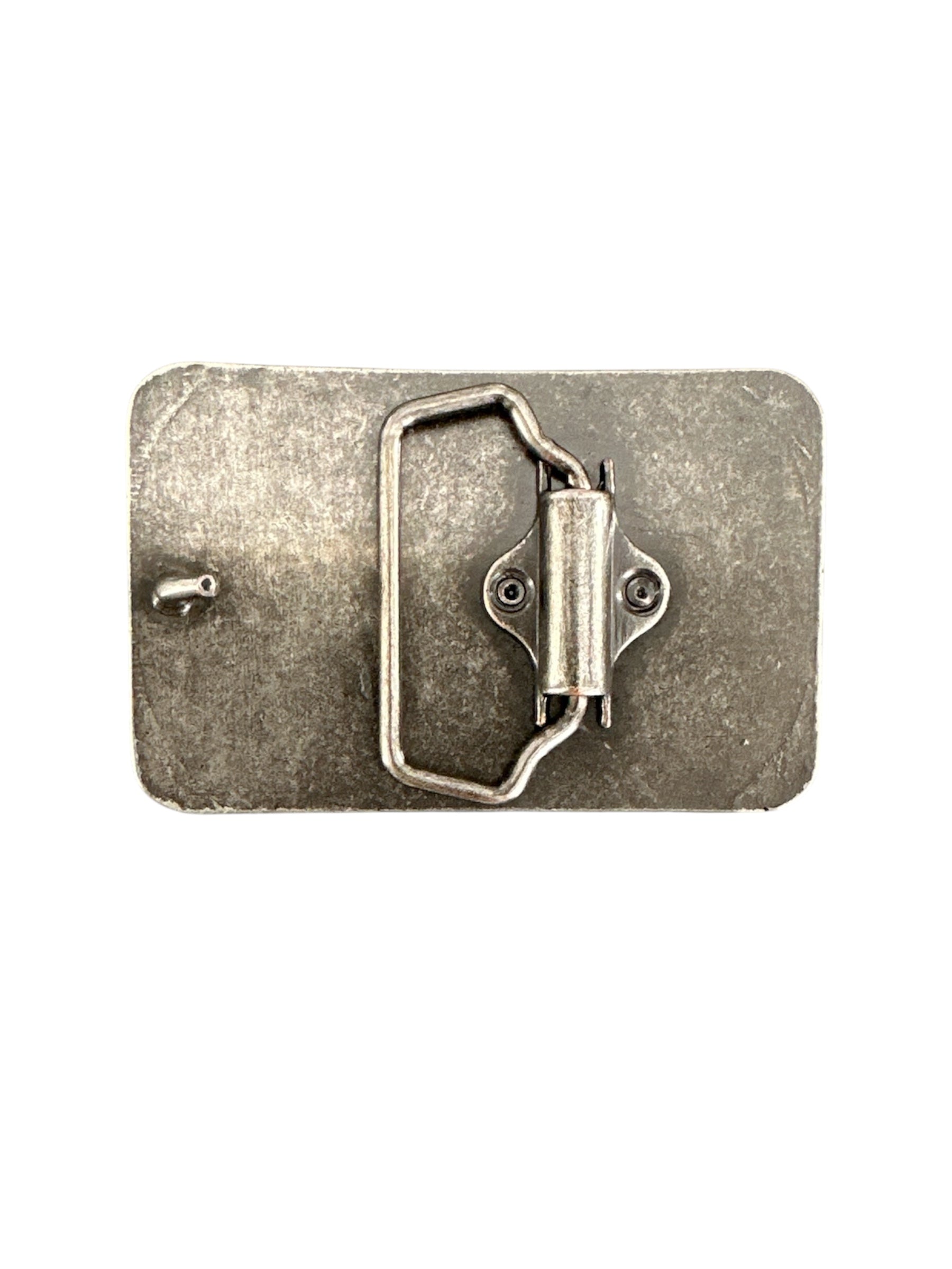 Back of metallic belt buckle on a white background