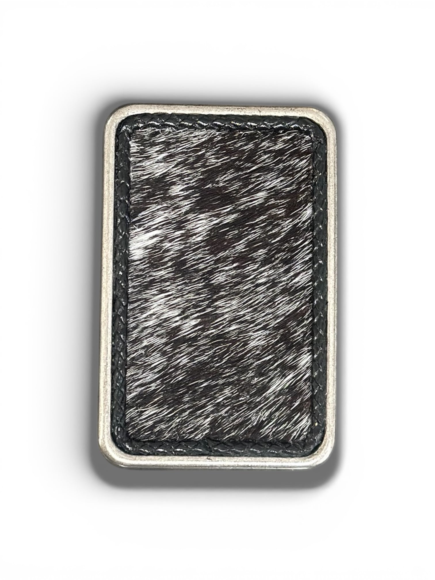 Rectangular silver tone belt buckle with hair on hide leather.
