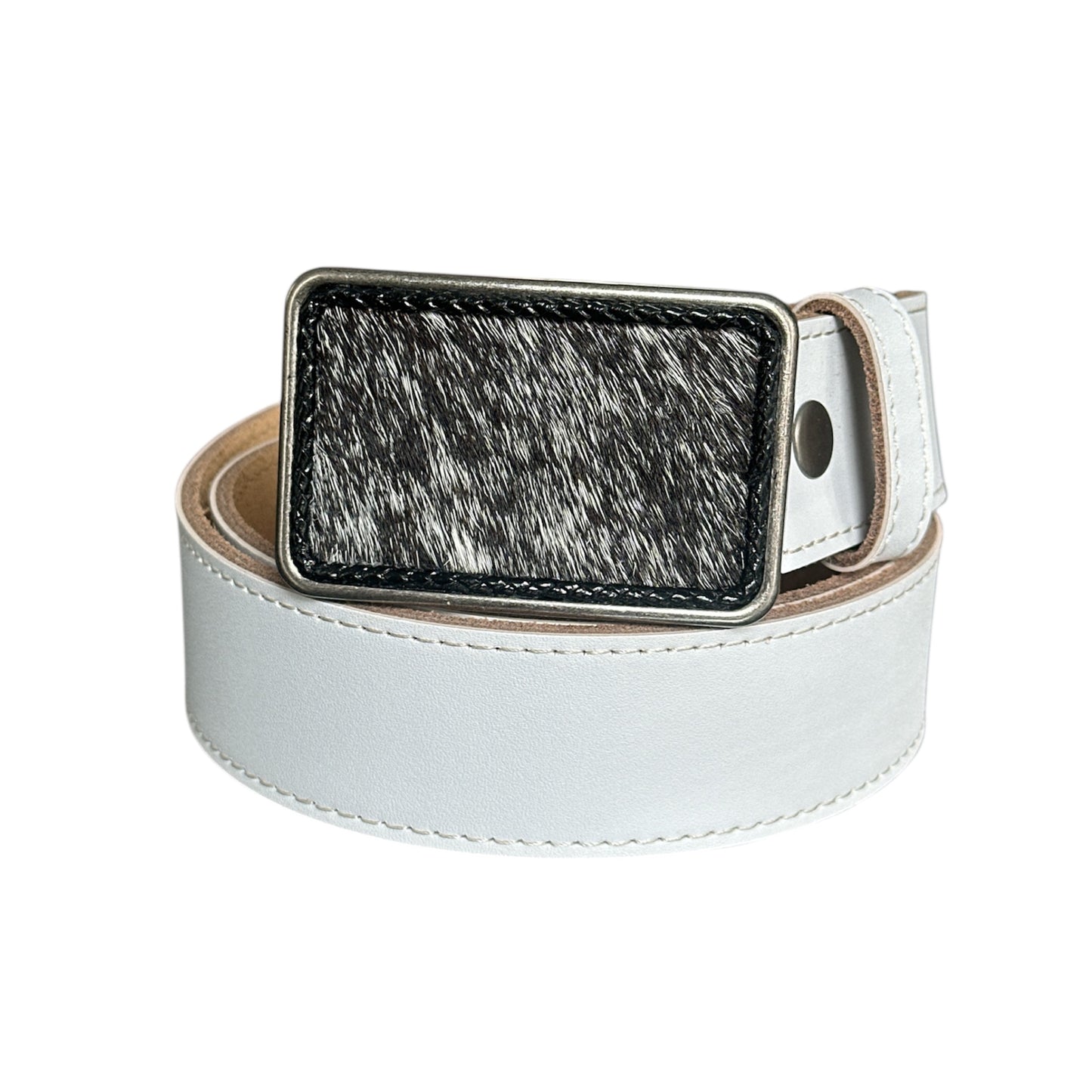 White belt with a black and white hair on hide on a white background